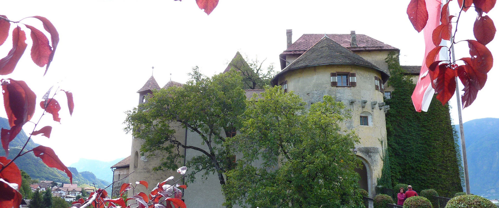 Schenna Castle. Between the trees and leaves you can see Schenna Castle.