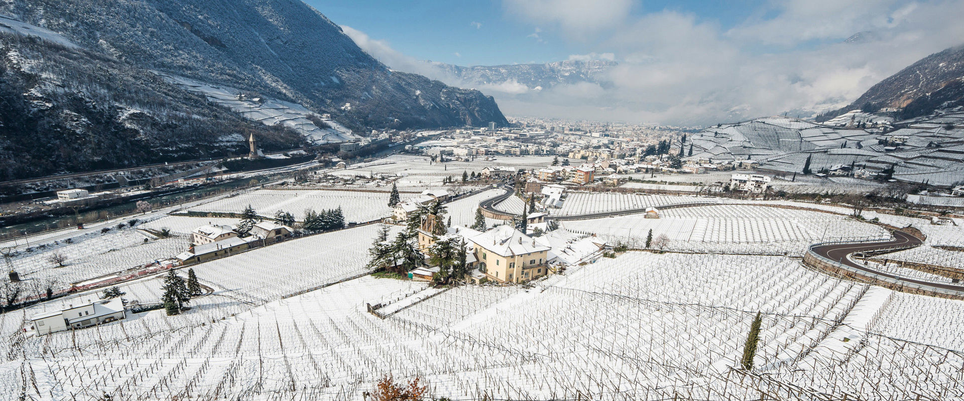 Bozen & environs Historical manor near Bozen, snow, vineyards and clouds