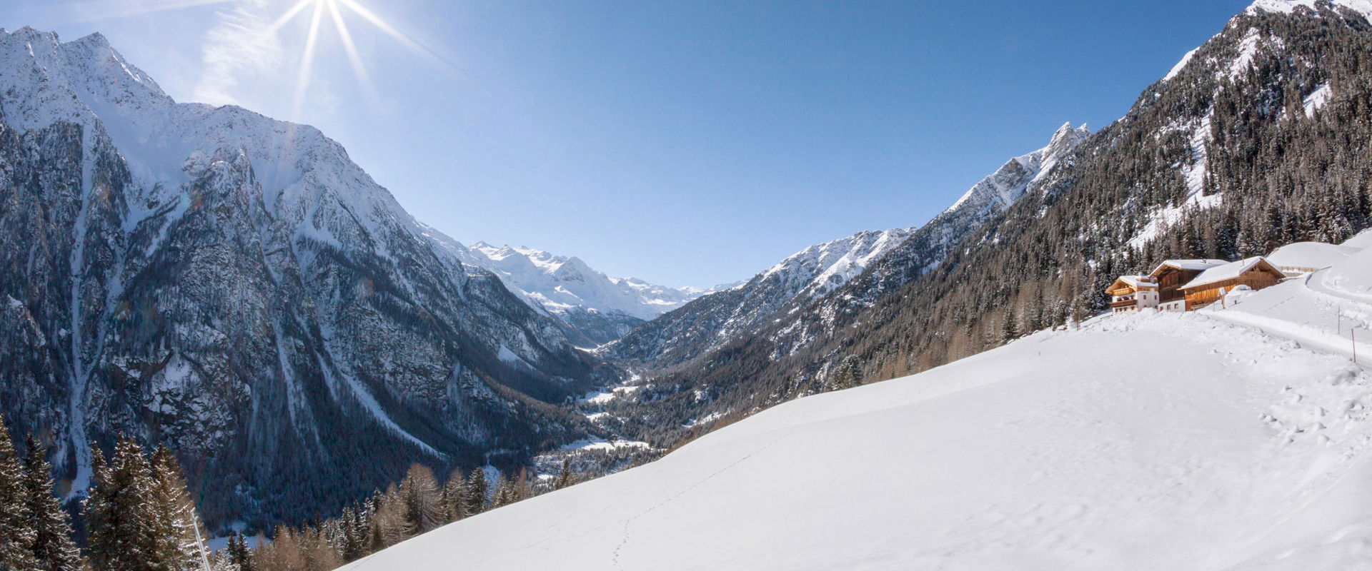 The Martelltal Valley in winter. The meadows and forests of the Martelltal Valley are covered in snow.