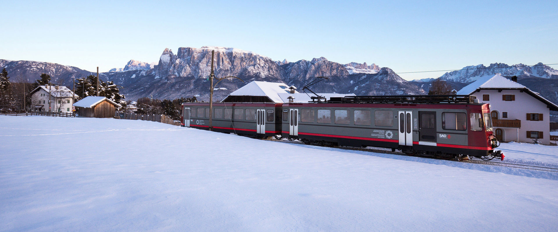 Klobenstein Ritten railway in Klobenstein in winter with Mt. Schlern in the background