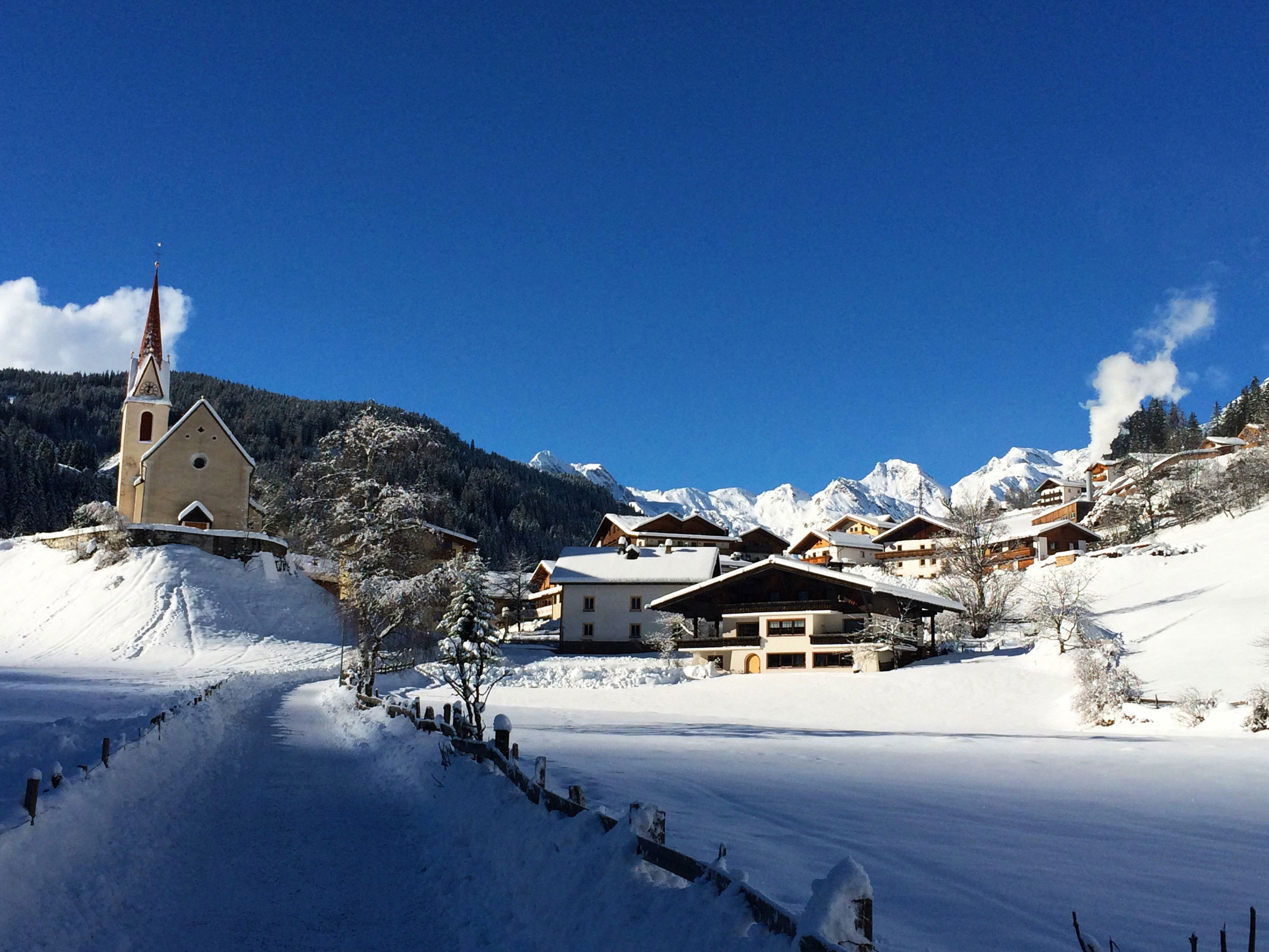 View of Ratschings mit parish church & snow landscape