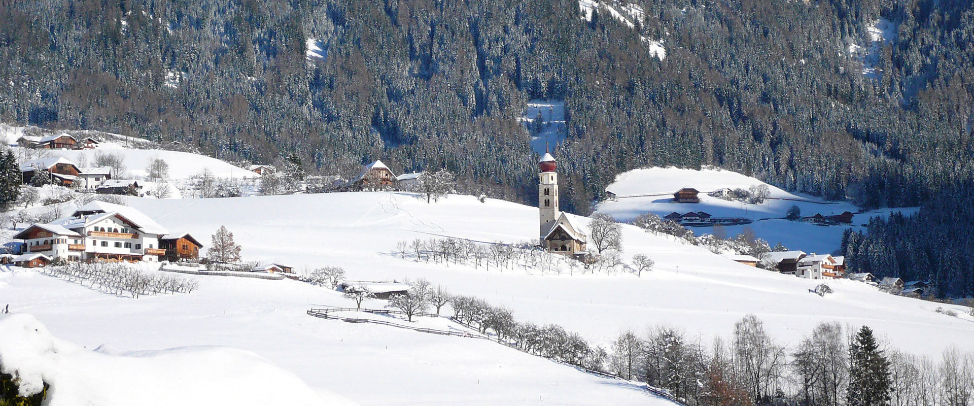 St. Valentine's Church and surrounding farms  St. Valentine's Church lies lonely in the landscape covered with fresh snow.