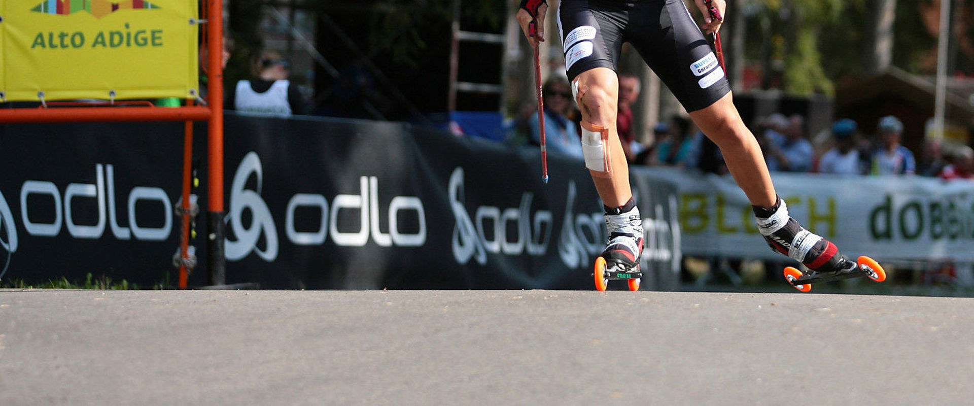 Rollerski in South Tyrol Athlete on rollerskis in Toblach.