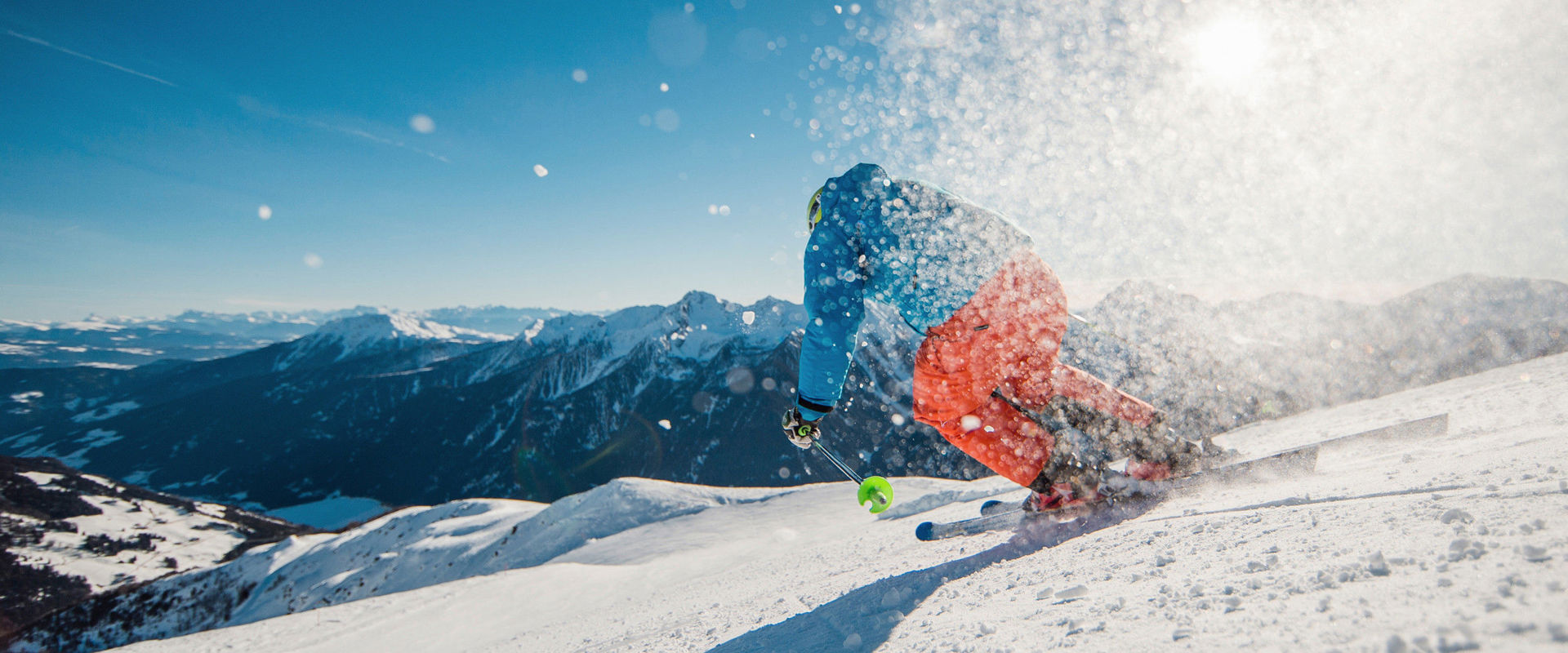 Ski area Schwemmalm Skier riding down the slope.