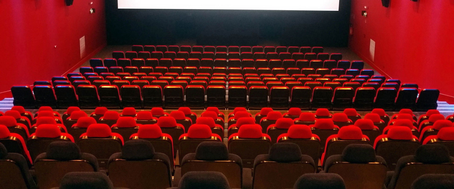 Cinema hall Empty cinema hall lit in red.