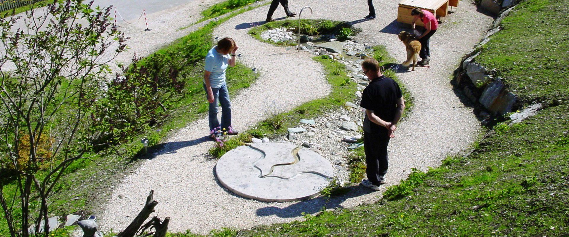 Baths Rumestluns in Wengen People at the sulphurous spring of Bad Rumestluns.