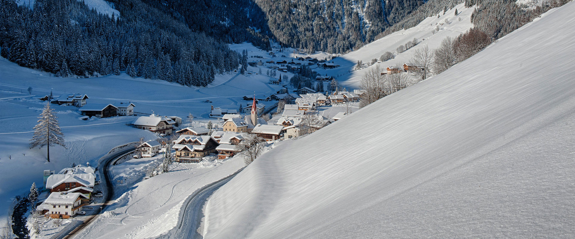 Weißenbach Weißenbach from above in the middle of winter and sunshine.