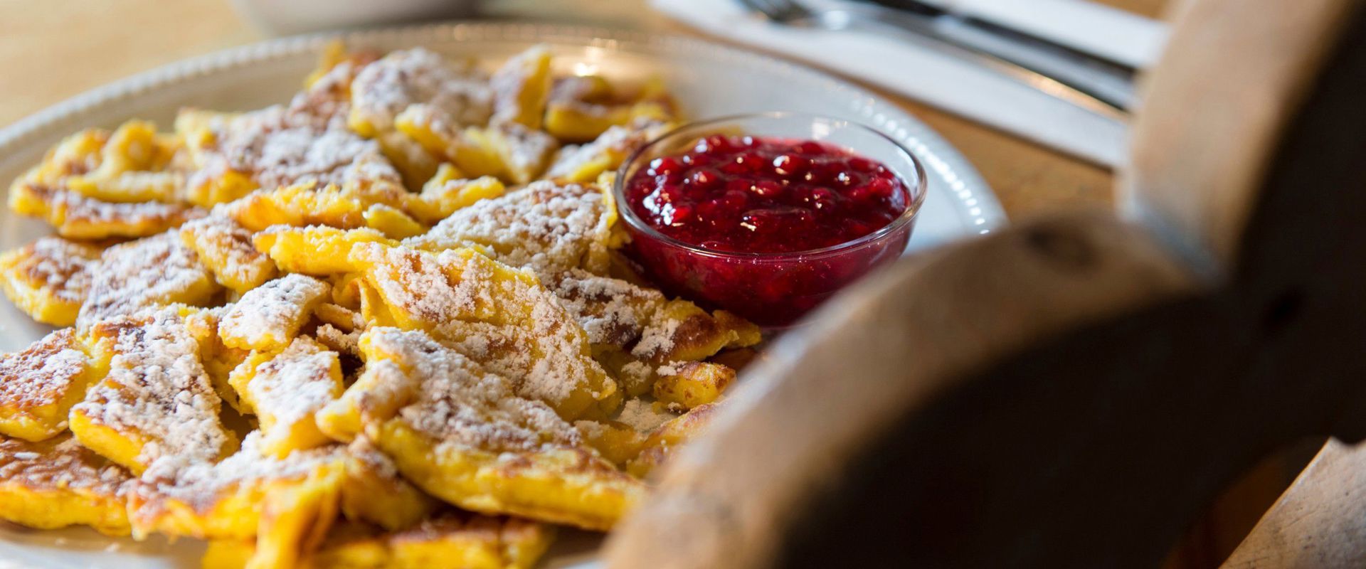 Plate with Kaiserschmarrn and cranberry jam.