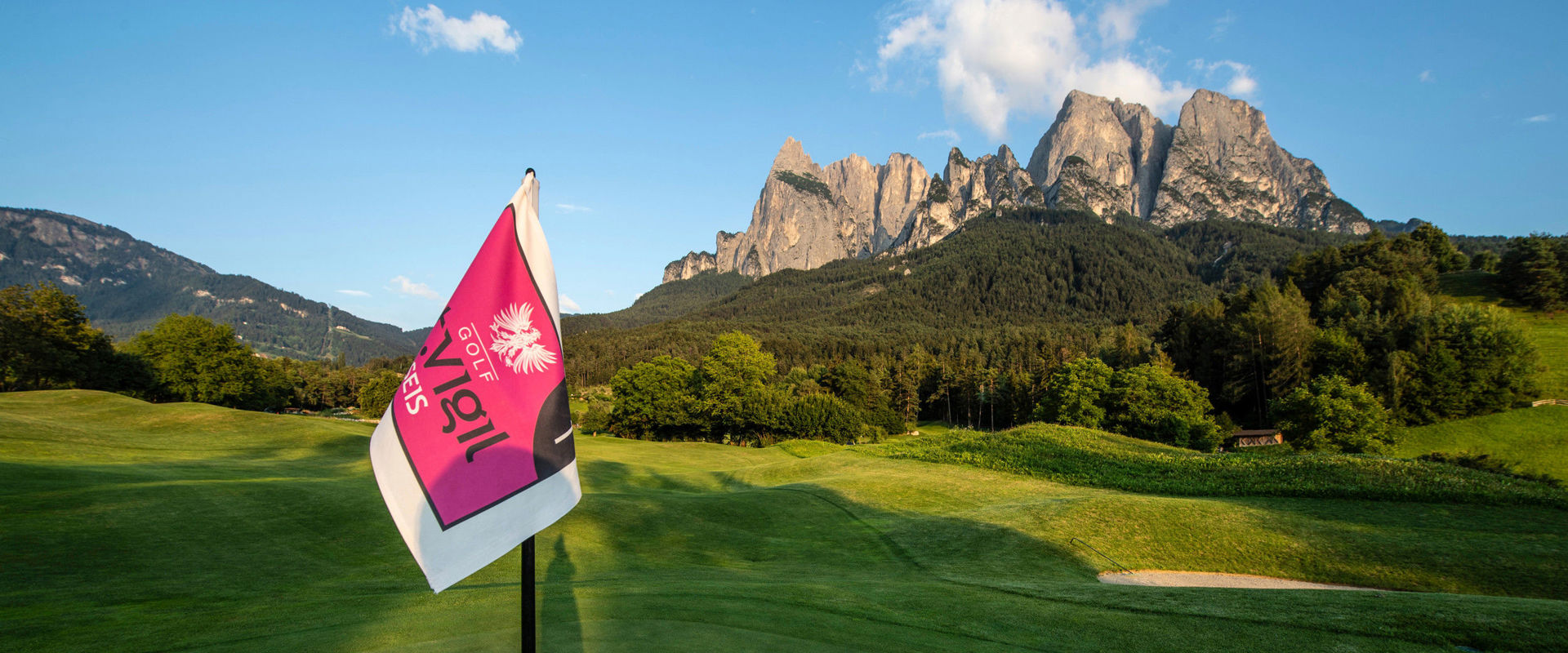 Golf Club St. Vigil Seis Golf course with a view of the Dolomites.