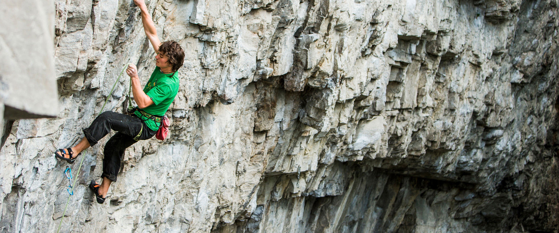 Climbing walls in South Tyrol - outdoor climbing A boy climbing on the Pursteinwand in Sand in Taufers.