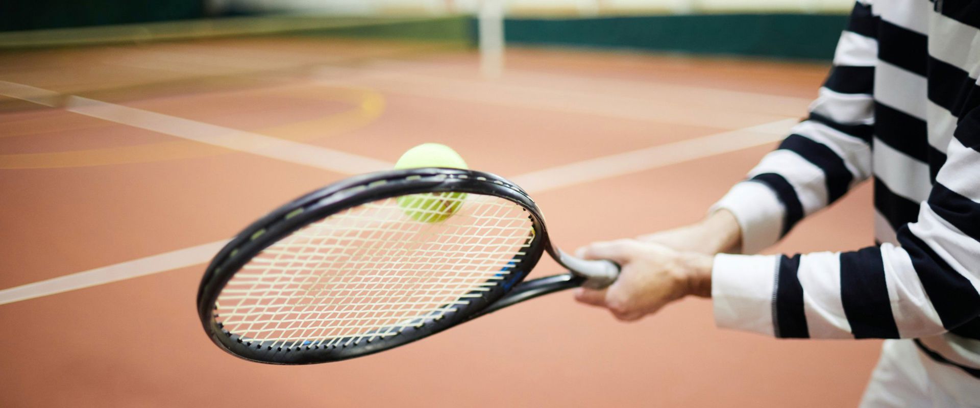 Tennis player on clay court Tennis player on clay court