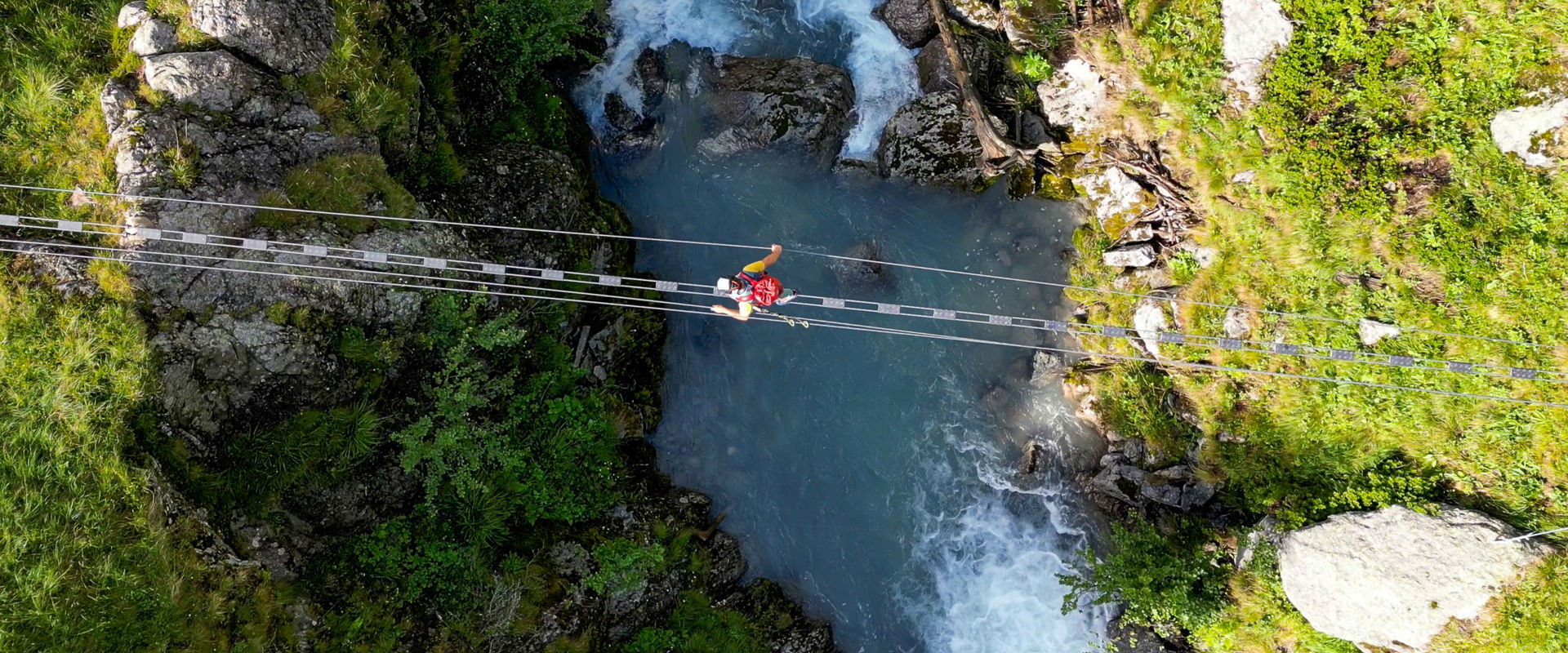View of the via ferrata suspension bridge from above.