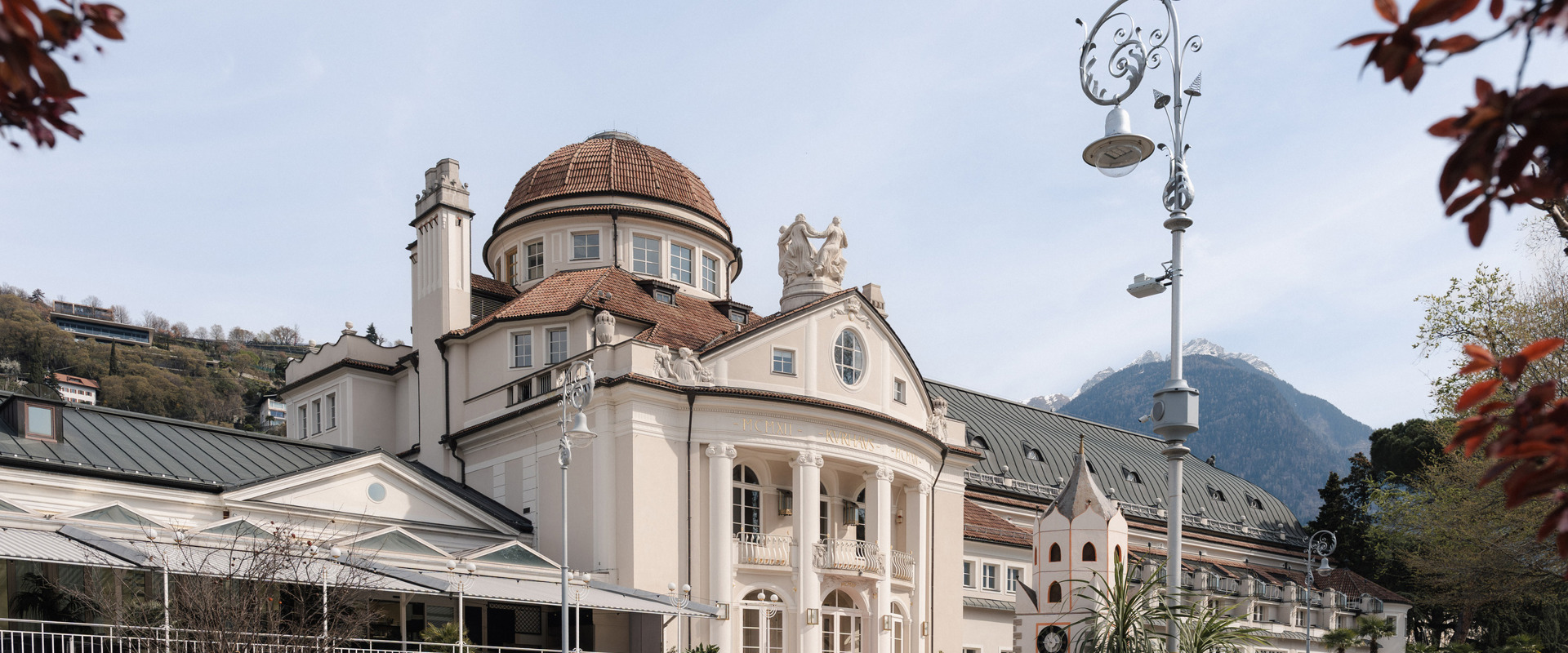 Elegant architecture of the Meran Kurhaus and Municipal Theatre.