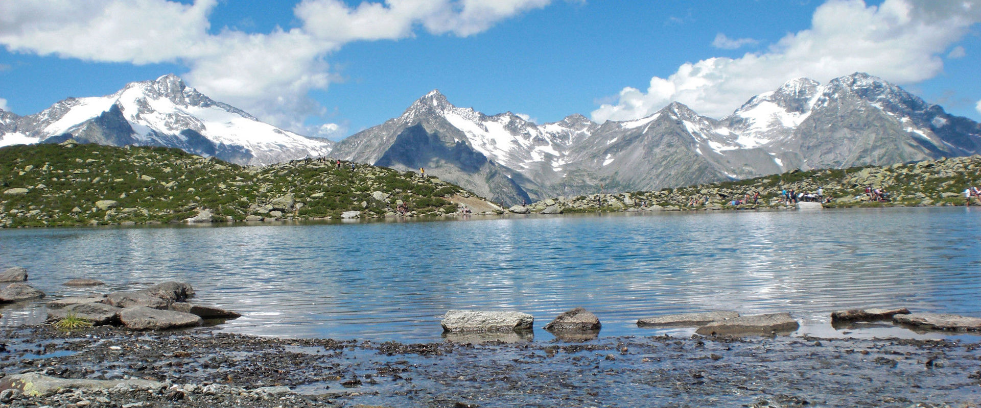 Lake Klausse Lake Klausse in summer with its clear waters and snow-capped peaks all around